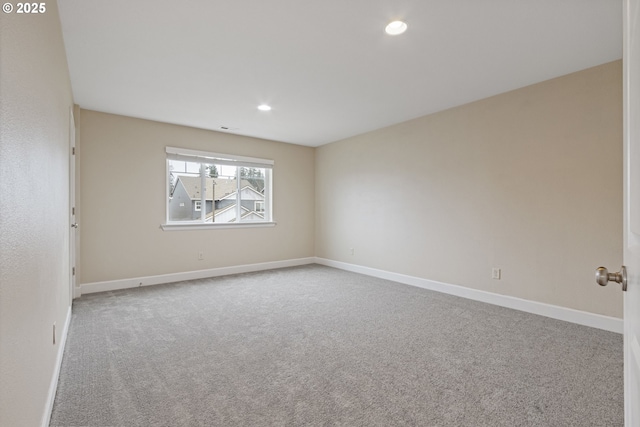 empty room featuring carpet floors