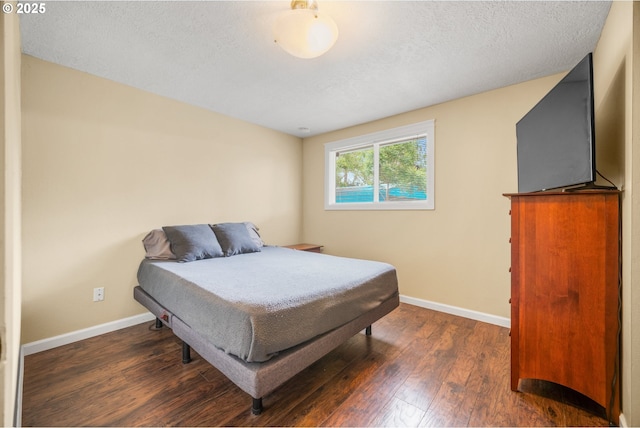 2115 NE 86th Ave, Vancouver, WA 98664 - bedroom featuring hardwood / wood-style flooring, baseboards, and a textured ceiling