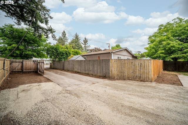 2115 NE 86th Ave, Vancouver, WA 98664 - fenced yard with a gate and concrete driveway