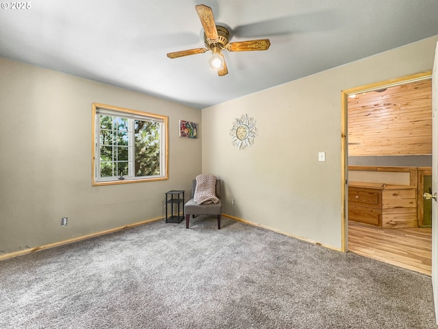 unfurnished room featuring ceiling fan, carpet floors, and baseboards
