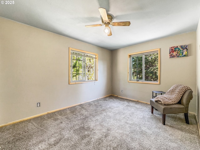 unfurnished room featuring a ceiling fan, plenty of natural light, carpet flooring, and baseboards