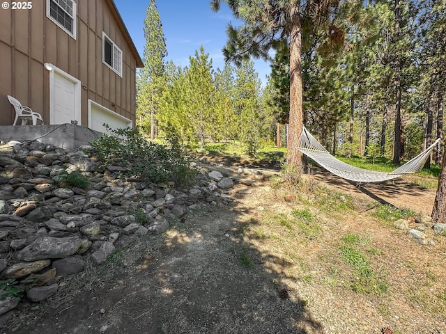 view of yard with a garage