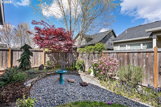 view of yard featuring a fenced backyard