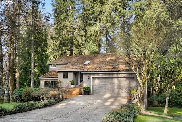 view of front of home featuring a garage and driveway