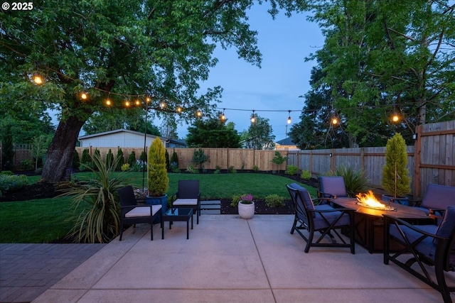 view of patio featuring a fire pit