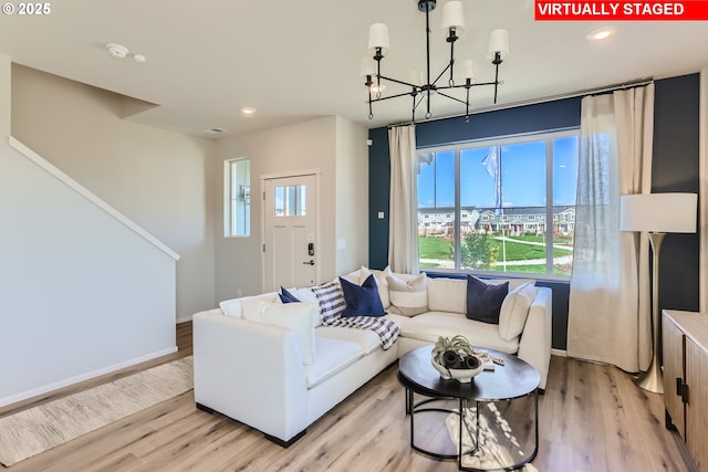 11325 NW Main St, North Plains, OR 97133 - living room with a chandelier, light wood-type flooring, recessed lighting, and baseboards