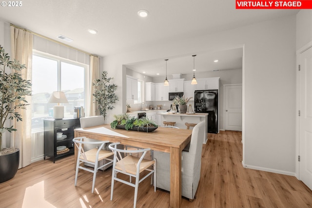 11325 NW Main St, North Plains, OR 97133 - dining space with recessed lighting, light wood-style floors, and baseboards