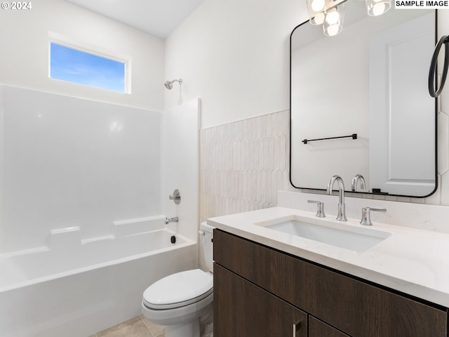 full bathroom featuring  shower combination, toilet, tile patterned floors, and vanity