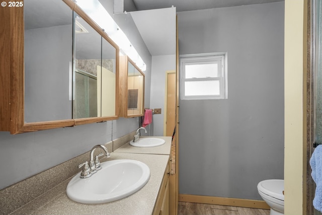 13307 SE Raymond St, Portland, OR 97236 - full bathroom featuring double vanity, toilet, and an enclosed shower