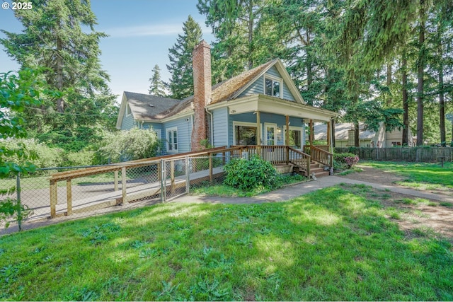 13307 SE Raymond St, Portland, OR 97236 - back of property featuring a chimney and a porch