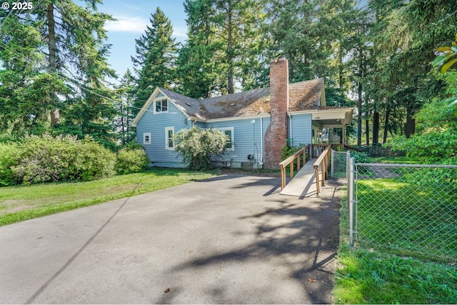 13307 SE Raymond St, Portland, OR 97236 - view of front of house with a chimney