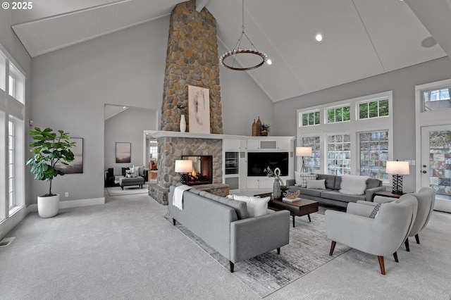 living area featuring visible vents, beam ceiling, high vaulted ceiling, carpet floors, and a fireplace