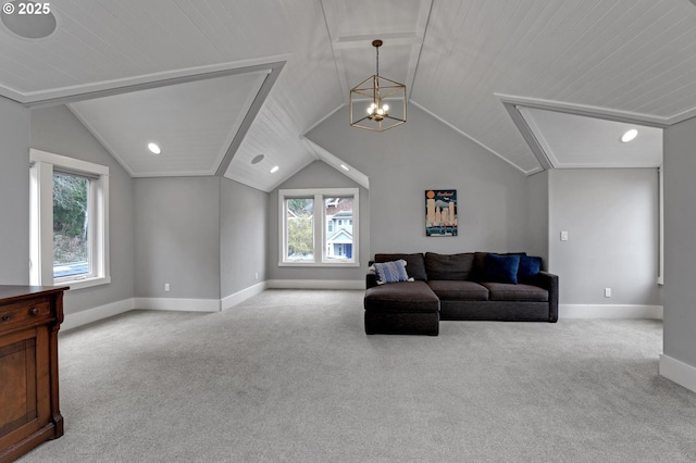 carpeted living room featuring a notable chandelier, baseboards, and vaulted ceiling