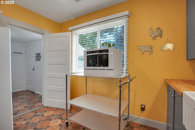 interior space with baseboards