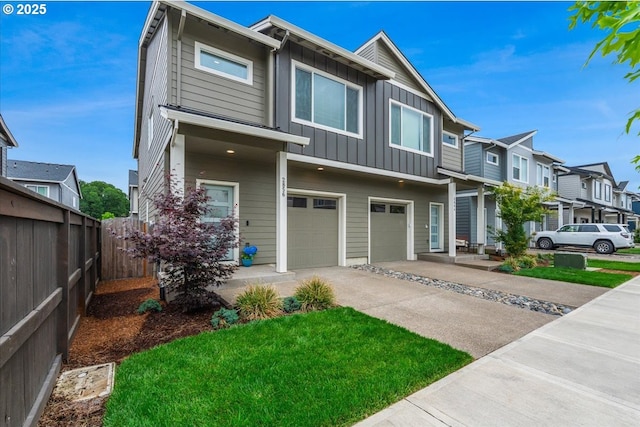 2856 S Nectarine St, Cornelius, OR 97113 - view of front of home featuring board and batten siding, a garage, driveway, and a residential view