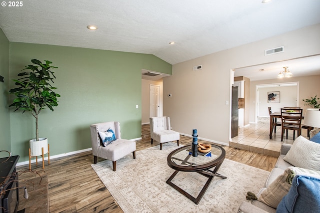 5354 Cody Ave, Eugene, OR 97402 - living room with light wood-style flooring, lofted ceiling, and recessed lighting