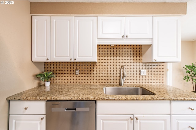 5354 Cody Ave, Eugene, OR 97402 - kitchen featuring dishwasher, tasteful backsplash, and white cabinetry