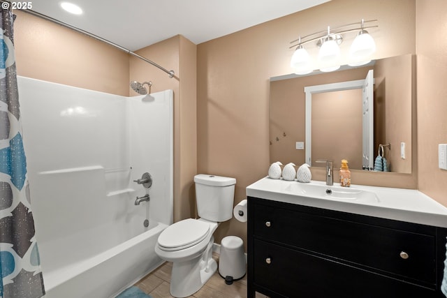 full bathroom with toilet, vanity, and shower / tub combo with curtain