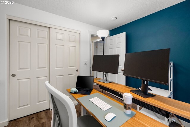 office area with wood finished floors