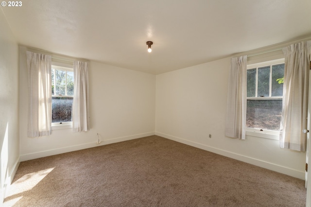 3148 Willamette St, Eugene, OR 97405 - carpeted empty room featuring baseboards