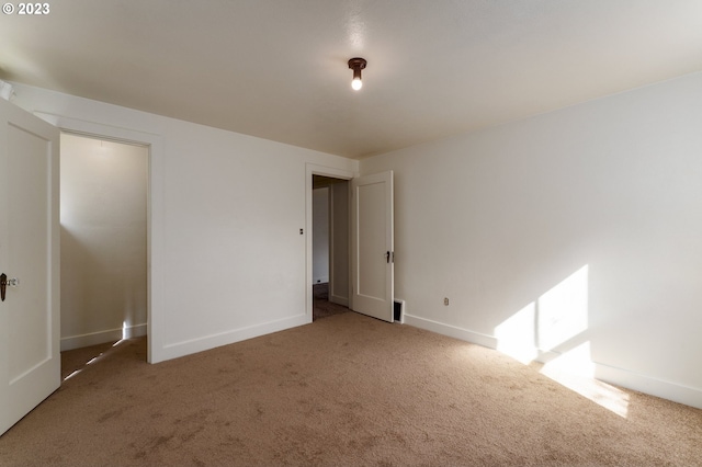 3148 Willamette St, Eugene, OR 97405 - unfurnished bedroom featuring carpet floors and baseboards