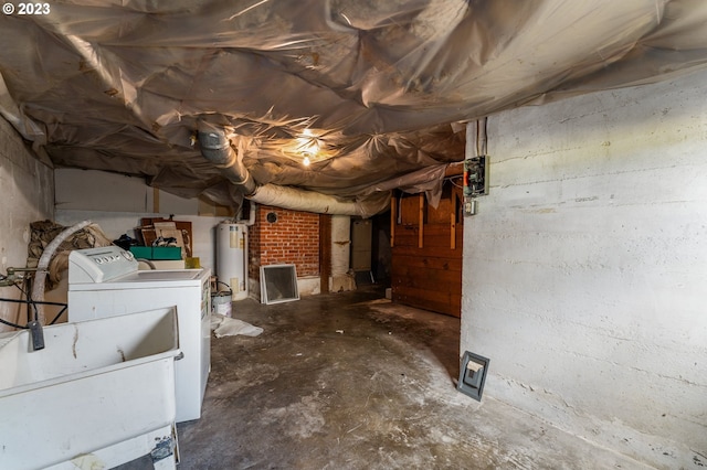 3148 Willamette St, Eugene, OR 97405 - unfinished basement featuring washer / clothes dryer, gas water heater, and a sink