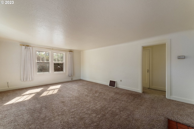 3148 Willamette St, Eugene, OR 97405 - spare room with carpet, baseboards, and a textured ceiling