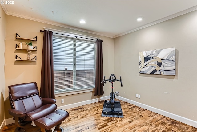 living area with recessed lighting, baseboards, wood finished floors, and ornamental molding