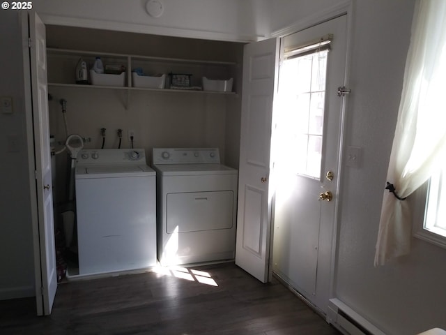 878 I St, Washougal, WA 98671 - laundry area with washing machine and clothes dryer, plenty of natural light, a baseboard heating unit, and wood finished floors