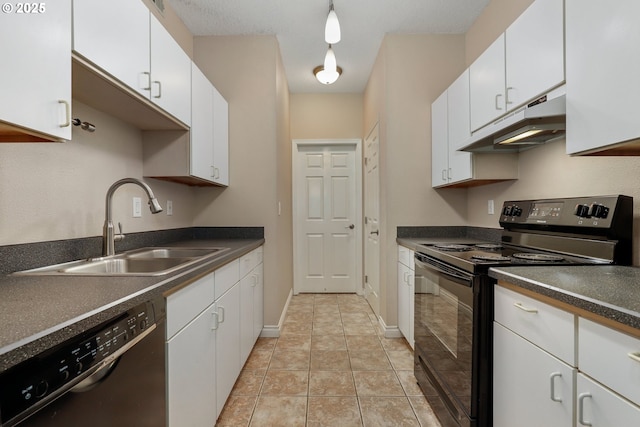 kitchen with light tile patterned flooring, decorative light fixtures, sink, white cabinets, and black appliances