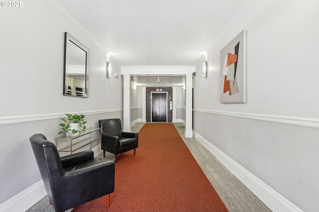 corridor featuring a textured ceiling, ornamental molding, wood finished floors, and baseboards