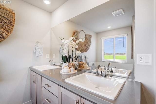 bathroom featuring vanity