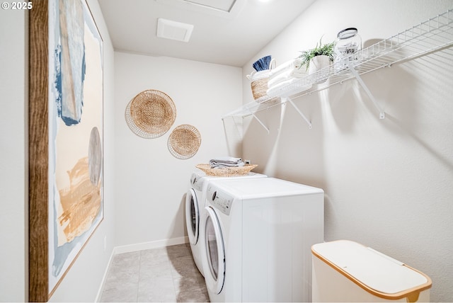 883 Legacy St, Eugene, OR 97402 - washroom with independent washer and dryer, baseboards, and light tile patterned flooring