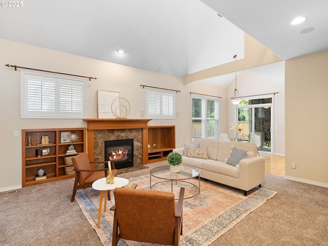 17712 SW 81st Pl, Durham, OR 97224 - living area with carpet, baseboards, a tile fireplace, recessed lighting, and high vaulted ceiling