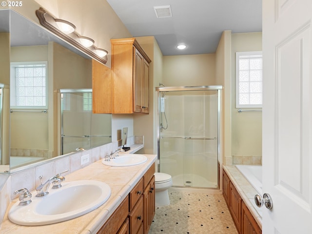 17712 SW 81st Pl, Durham, OR 97224 - full bath with healthy amount of natural light, a shower stall, and double vanity