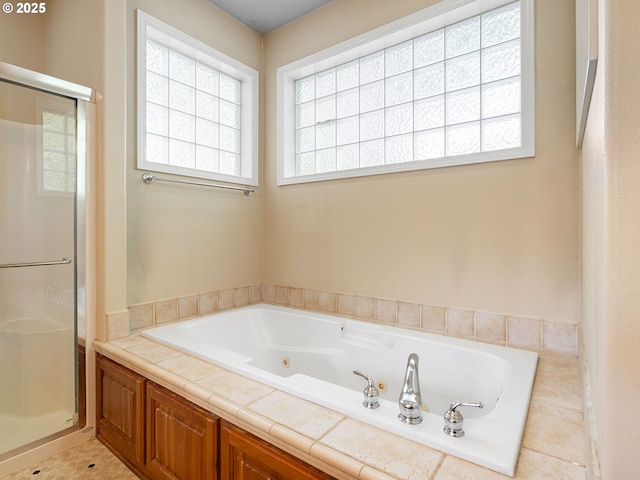 17712 SW 81st Pl, Durham, OR 97224 - full bathroom with healthy amount of natural light, a stall shower, and a tub with jets