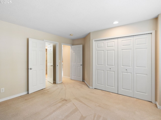 17712 SW 81st Pl, Durham, OR 97224 - unfurnished bedroom with light colored carpet, baseboards, a closet, and recessed lighting