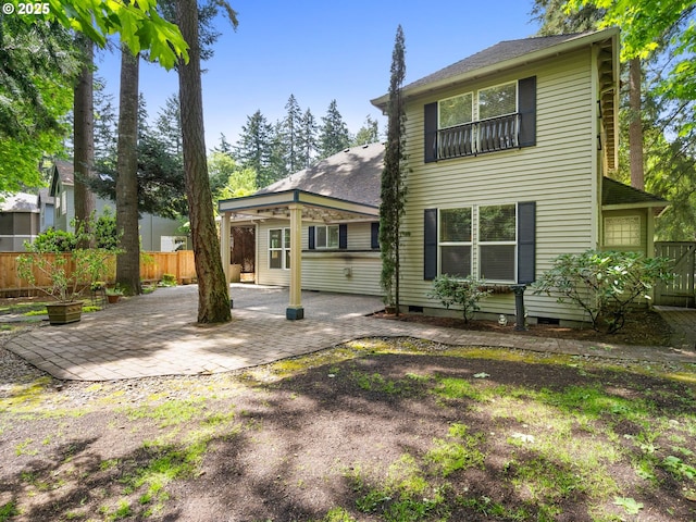 17712 SW 81st Pl, Durham, OR 97224 - back of property featuring a patio area, fence, crawl space, and roof with shingles