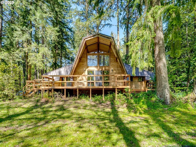 26619 NE 77th Ave, Battle Ground, WA 98604 - back of house featuring a yard, a deck, and metal roof