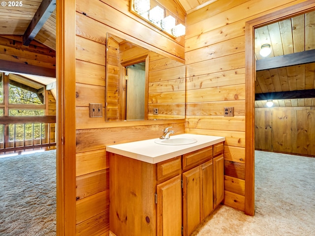 26619 NE 77th Ave, Battle Ground, WA 98604 - bathroom with vanity, lofted ceiling with beams, wooden walls, and wooden ceiling