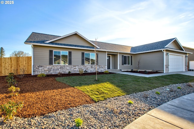 single story home featuring fence, an attached garage, a shingled roof, a front lawn, and stone siding