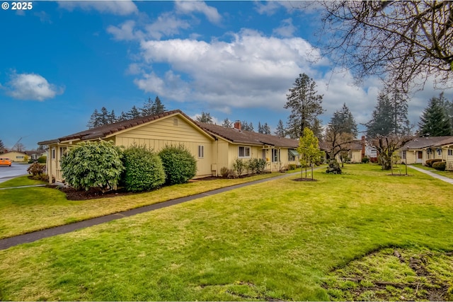 exterior space with a front yard