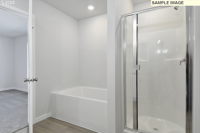 5329 NE 68th St, Vancouver, WA 98661 - full bathroom with a shower stall, a bath, baseboards, and wood finished floors