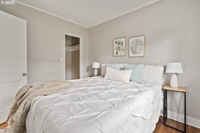 2643 NW Raleigh St Unit 30, Portland, OR 97210 - bedroom featuring crown molding and wood finished floors
