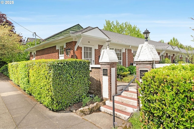 2643 NW Raleigh St Unit 30, Portland, OR 97210 - view of front of property featuring brick siding