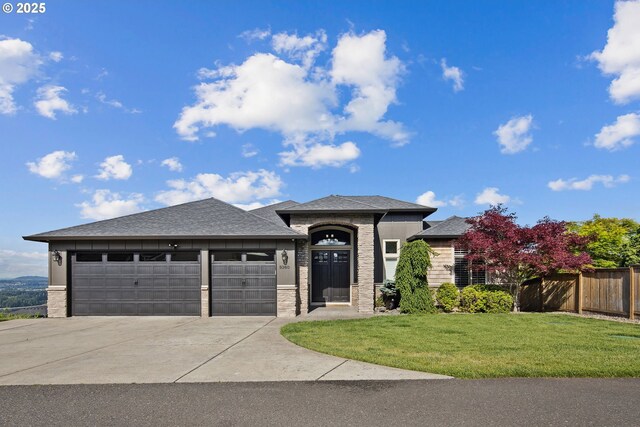 5360 NW 18th Ave, Camas, WA 98607 - view of front of home with a garage, driveway, stone siding, and a shingled roof