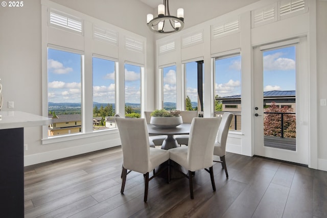 5360 NW 18th Ave, Camas, WA 98607 - dining room with a chandelier, dark wood-style flooring, and baseboards