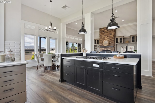 5360 NW 18th Ave, Camas, WA 98607 - kitchen featuring stainless steel gas stovetop, dark cabinetry, light countertops, dark wood-type flooring, and recessed lighting