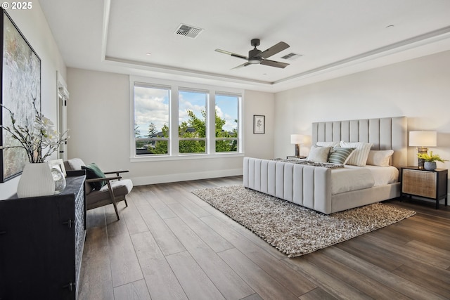 5360 NW 18th Ave, Camas, WA 98607 - bedroom featuring a raised ceiling, dark wood finished floors, baseboards, and a ceiling fan
