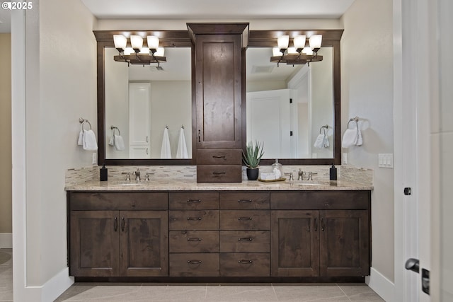 5360 NW 18th Ave, Camas, WA 98607 - bathroom with a chandelier, double vanity, baseboards, and tile patterned flooring
